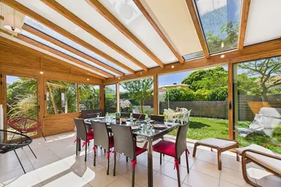 Image de Maison pour 8 - 5min de la plage - jardin & véranda
