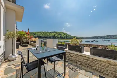 Image de Maison de vacances 'Évasion Marine Face À La Mer' avec vue sur la mer, terrasse privée et Wi-Fi