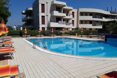 Image de Appartement 'Résidence Aurora Park' avec piscine partagée, terrasse privée et climatisation