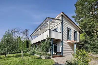 Image de Maison de vacances \"Ferienhaus Das Große Paradies\" avec sauna, jardin, bain à remous et Wi-Fi