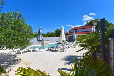 Image de Maison de vacances Pomer pour 1 - 10 personnes avec 5 chambres à coucher - Maison de vacances