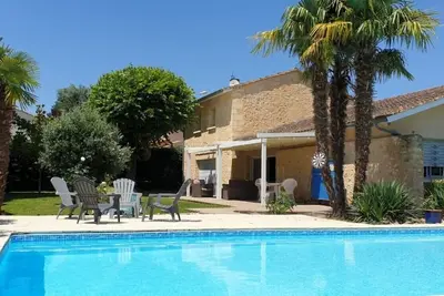 Image de Maison familiale en pierre aux portes de Bordeaux, jardin ombragé et piscine
