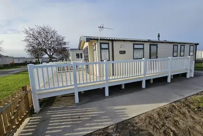 Image de 208 Unity Beach 6 berth enc garden no pets