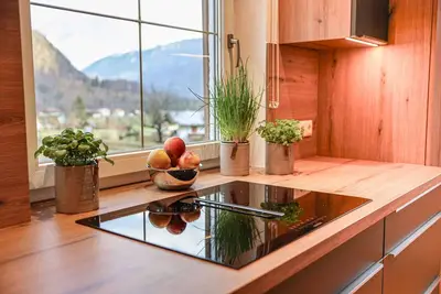 Image de Ferienwohnung für 1 - 5 Personen mit 2 Schlafzimmern, Großer Wohnküche, 2 Bädern, Separates Wc, Schwedenofen, Terrasse