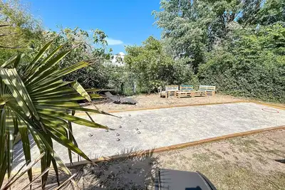 Image de Maison de vacances à 350m de la plage avec jardin, véranda et Wi-Fi gratuit