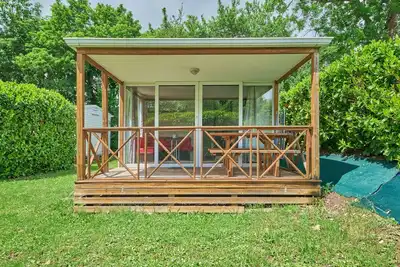 Image de Mobile Home \"4 Personnes 208\" avec piscine partagée et terrasse privée