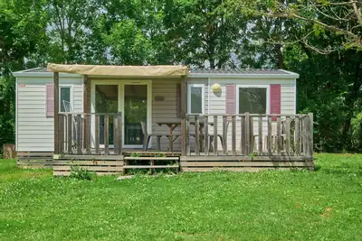 Image de Mobile Home \"4 Personnes 207\" avec piscine partagée et terrasse privée