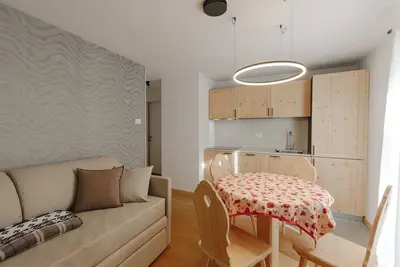 Image de Appartement 'Aurone' avec vue sur les montagnes, jardin commun et Wi-Fi