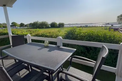 Image de Ostseechalet Kompass - Direkter Meerblick, Ăśberdachte Terrasse, Parkplatz, Wlan