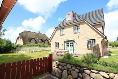 Image de Ferienhaus Tieden Hüs