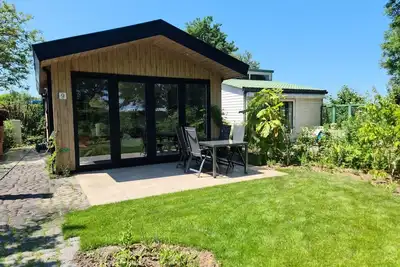 Image de Dune lodge directly against the dunes for 4 persons. Near the Beach. Alkmaar Cheese Market.