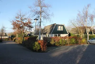 Image de Dune Bungalow directly against the dunes for 5 persons. Modern, Warm, Atmospheric, Nature, Walking, Peaceful and quiet, Egmond.