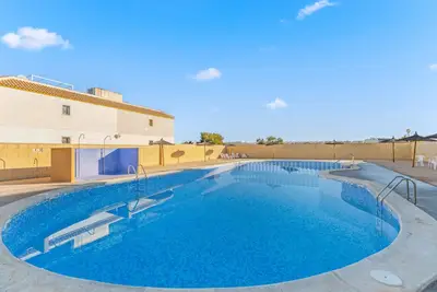 Image de Appartement 'Casa Feliz' avec vue sur les montagnes, piscine partagée et Wi-Fi