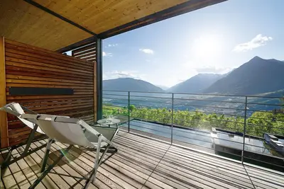 Image de Appartement 'Dahoam - Vistasuite' avec vue sur la montagne, piscine partagée et Wi-Fi