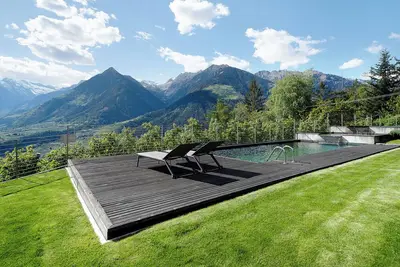Image de Studio 'Dahoam - Relaxsuite' avec vue sur les montagnes, piscine partagée