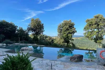 Maison de vacances 'Borgo Mommialla Casa Dell'artista' avec piscine partagée, Wi-Fi et climatisation