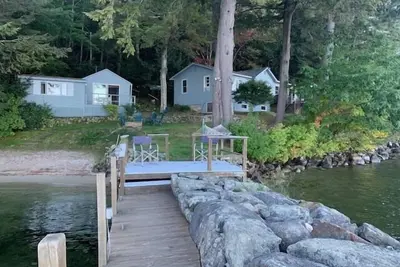 Charming Lakefront Home with Guest Cottage and Stunning Views