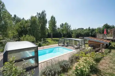 Maison de vacances 'Piscine Spa Et Sauna Privé' avec vue sur lac, piscine privée et Wi-Fi