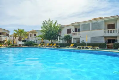 Image de Appartement 'Apartamento Flora' avec piscine partagée, terrasse privée et Wi-Fi