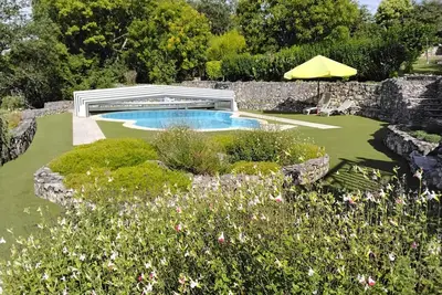 Image de Tour en pierre rénovée avec piscine privée