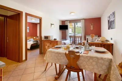 Image de Appartement \"Chalet Primula 11\" avec vue sur les montagnes, terrasse privée et Wi-Fi