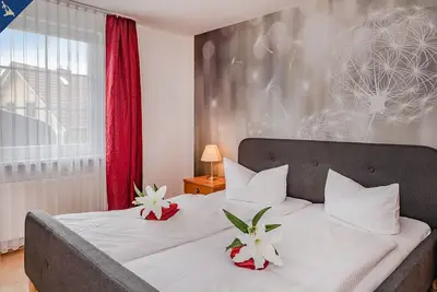 Image de Ferienwohnung Waldhaus 4. 2 - GemĂĽtlicher Ferienbungalow in Ruhiger Waldrandlage, 800 m vom