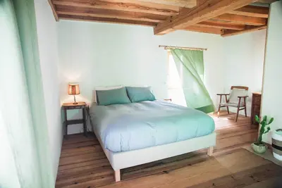 Image de Chambre avec vue mer dans l'éco-lodge de Carbonaccio
