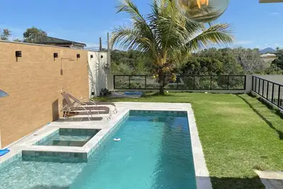 Image de Casa de Praia com 3 SuĂtes Climatizadas e Piscina IncrĂvel