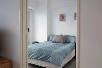 Image de Modern apartment featuring a rooftop swimming pool with a spectacular view.