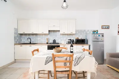 Image de Appartement 'Ziu Jori' avec terrasse privée, jardin partagé et Wi-Fi