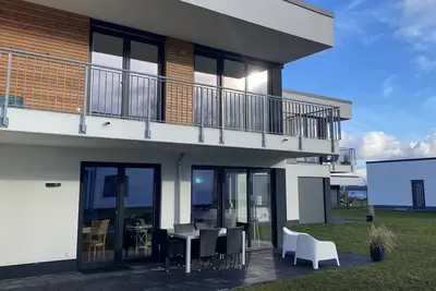 Image de Wohnung Seebrise Komfort - Ferienwohnung mit Terrasse und Garten