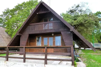 Image de Maison avec vue sur le lac, pour 9 personnes-anciennement Tui Ferienhaus