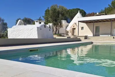 Image de Luxurious villa \/ Trullo - Breathtaking views - 4x10 m private salt water pool