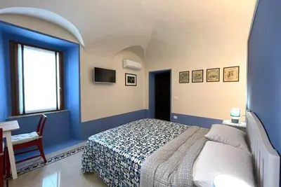 Image de Appartamenti Indipendenti per 4 Persone in Palazzo Storico