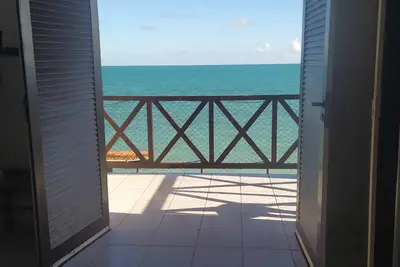 A private chale less than 20 feet from the ocean