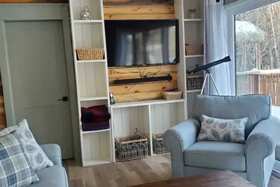 Image de Cozy cottage on a private beach.