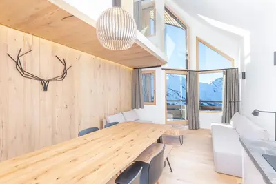 Image de Luxueux triplex 5 pièces avec mezzanine, rénové, balcon et accès direct aux pistes