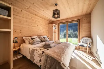 Image de Appartement de vacances 'Le Chalet Des Praz' avec vue sur les montagnes, jardin et Wi-Fi