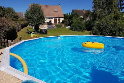 Image de Maison vue Seine-Jardin 1400m2-Piscine chauffée-5 chambres-libre 01\/07 au 30\/08