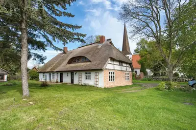 Image de Maison de vacances 'Pommernhuus An De Kark' avec jardin privé