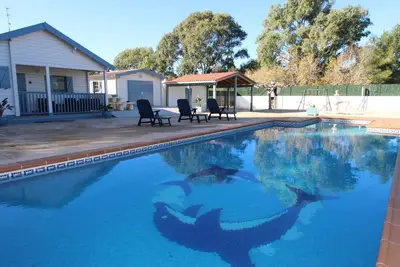 Image de Maison près de la plage avec piscine privée, Wi-Fi, clim, animaux bienvenus