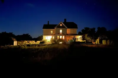 Image de A Block Island landmark with historic charm, gardens, long water views