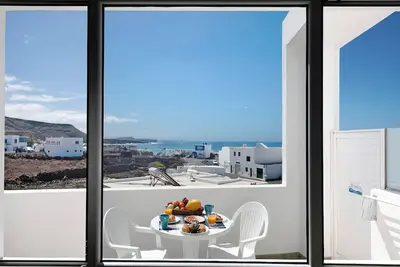 Image de Maison de vacances 'Viviendas El Pescador - Vela' avec terrasse partagée et Wi-Fi