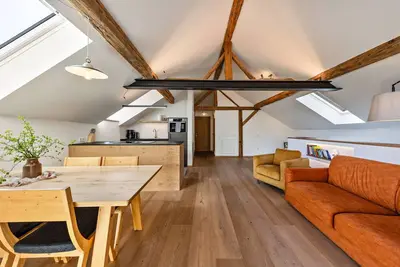 Image de Appartement 'Firmelein - Dachwohnung' avec vue sur les montagnes, terrasse privée et Wi-Fi