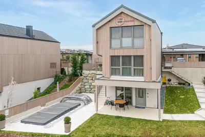 Image de Ferienhaus mit Pool