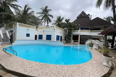 Image de Maison de vacances Diani Beach pour 1 - 8 personnes avec 4 chambres Ă coucher - Maison de vacances
