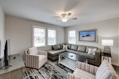 Spacious dog-friendly home with screened-in porch & pool  - steps from the sand