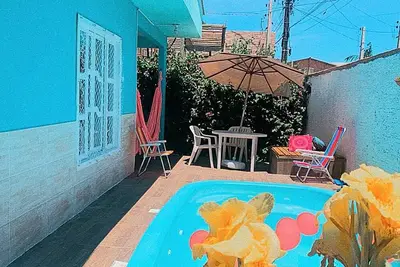 Image de Casa Jardim Secreto. Comodidade e DiversĂŁo PrĂłxima da Praia