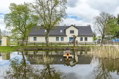 Image de Appartement \"Gute Stube\" avec vue sur le lac, jardin partagé et Wi-Fi