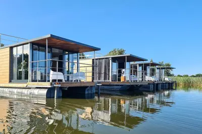 Image de Maison confortable sur l'eau pour 2 personnes. -anciennement Tui Ferienhaus